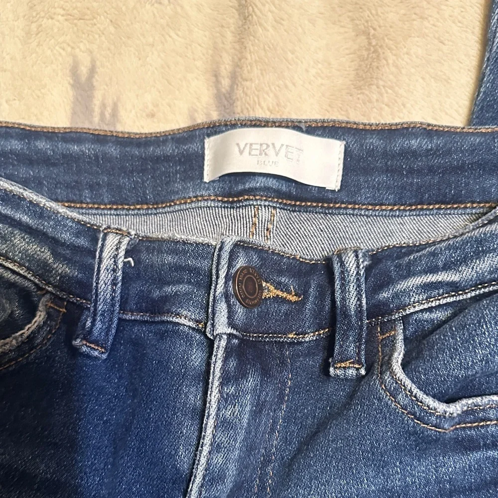 A181.   Verve Women's Distressed Blue Skinny Jeans